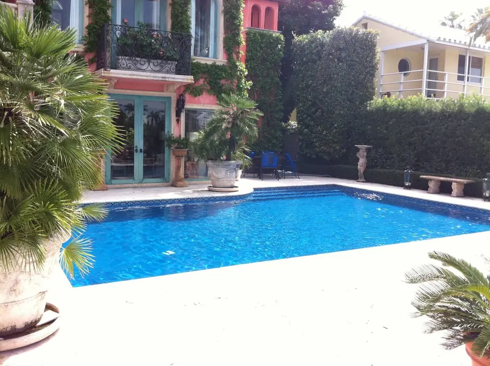 New construction swimming pool with custom decking in Miami-Dade