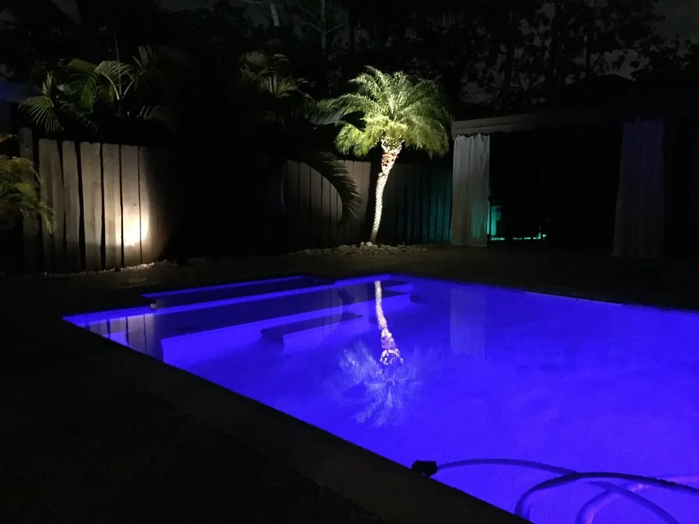New construction swimming pool with custom decking in Miami-Dade