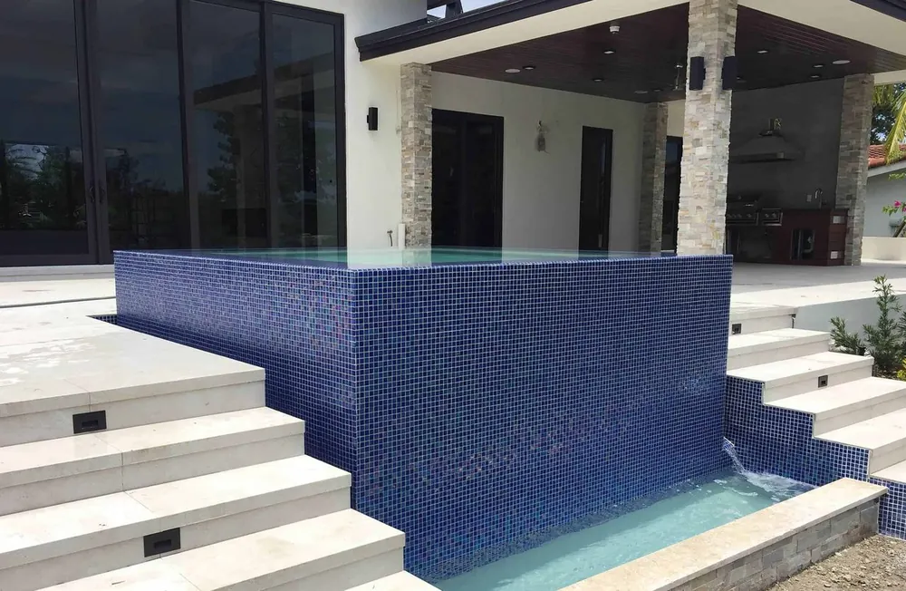 Inground pool with spa and water features in Miami-Dade County