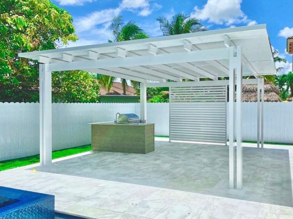 Modern slatted pergola over a poolside outdoor kitchen in Miami