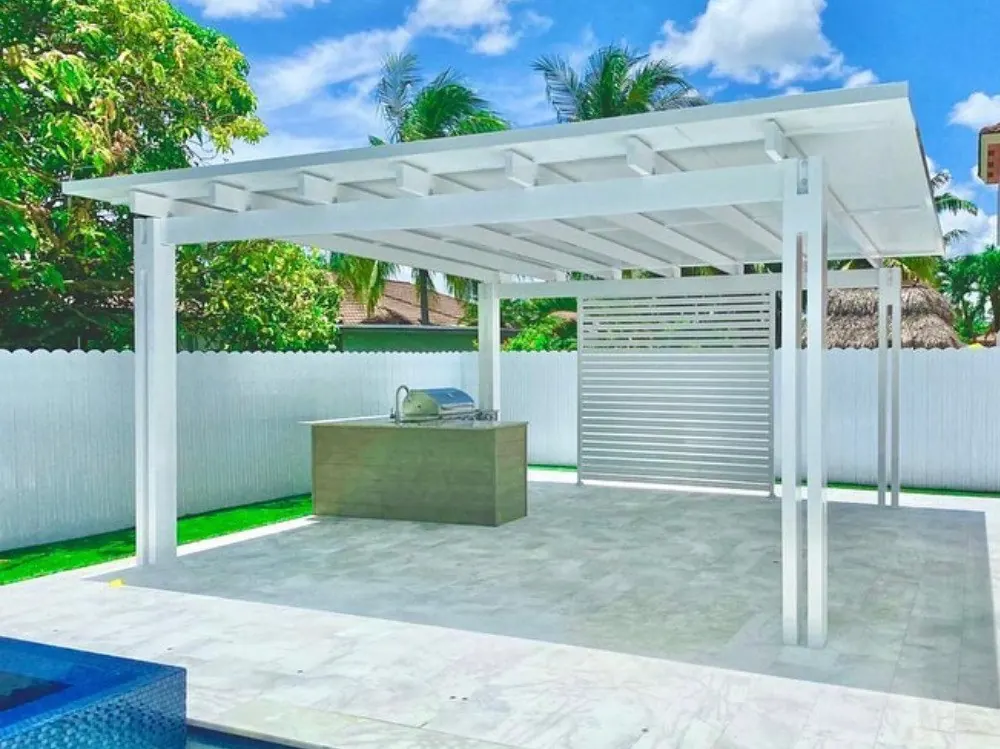Custom pergola shading a new pool patio in Coral Gables FL